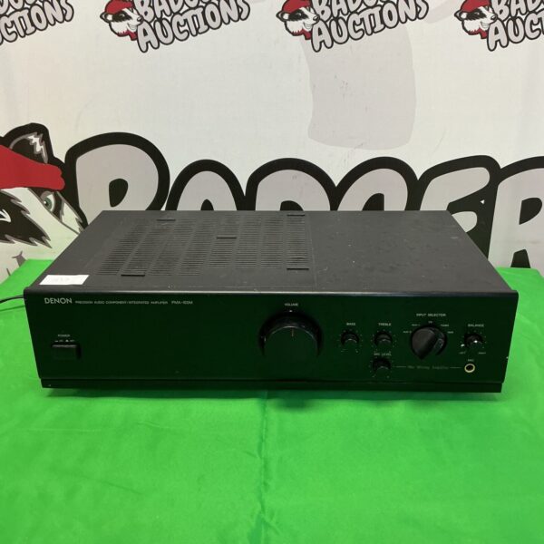 Front view of a vintage Denon PMA-100M integrated amplifier.