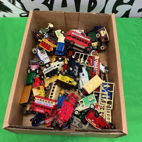 Vintage diecast car lot including Matchbox models for collectors.
