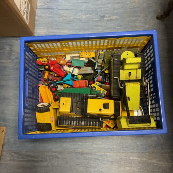 Crate of vintage diecast model vehicles including Tonka and Matchbox.