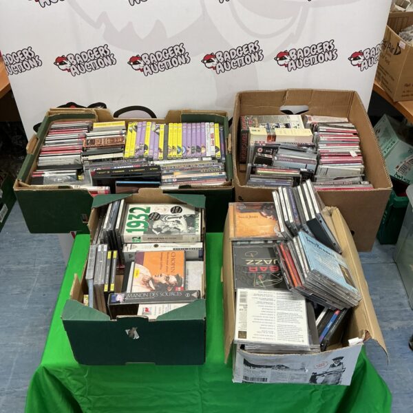 Large lot of assorted DVDs for movie enthusiasts.