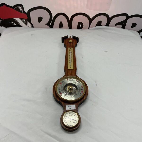 Vintage Fischer barometer for measuring atmospheric pressure and forecasting weather.