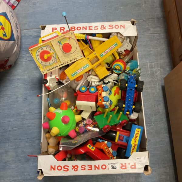 Vintage Fisher Price toys lot with Bumble Ball and colourful plastic toys.