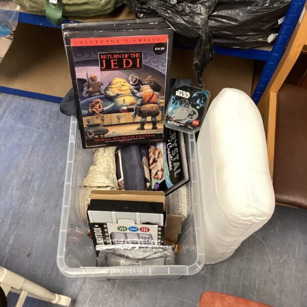 Mixed house clearance lot with Star Wars calendar visible.