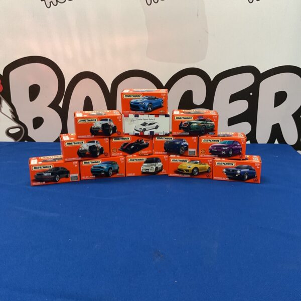 Boxed collection of vintage Matchbox diecast toy cars.