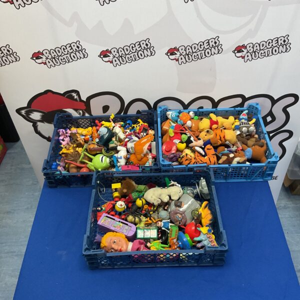 Mixed toy lot with Disney figures and Winnie the Pooh plushies.