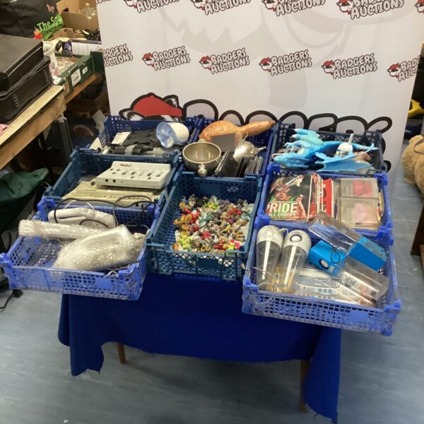 Mixed toy and magazine lot with various collectables.