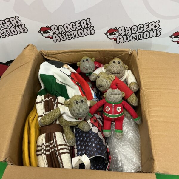 A lot of vintage PG Tips monkey figures in a box.