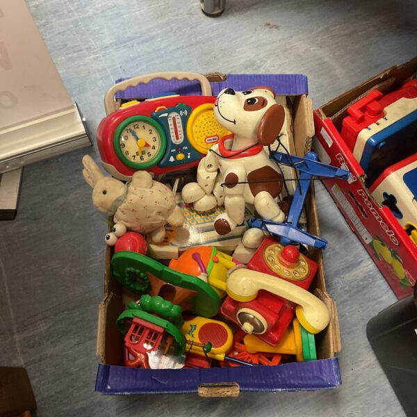 Vintage toy lot including Tomy dog and Little Tikes pieces.