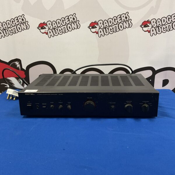 Vintage Rotel RA-931 integrated amplifier, black finish, front view.
