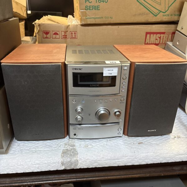 Vintage Sony S-Master amplifier system with speakers, side view.