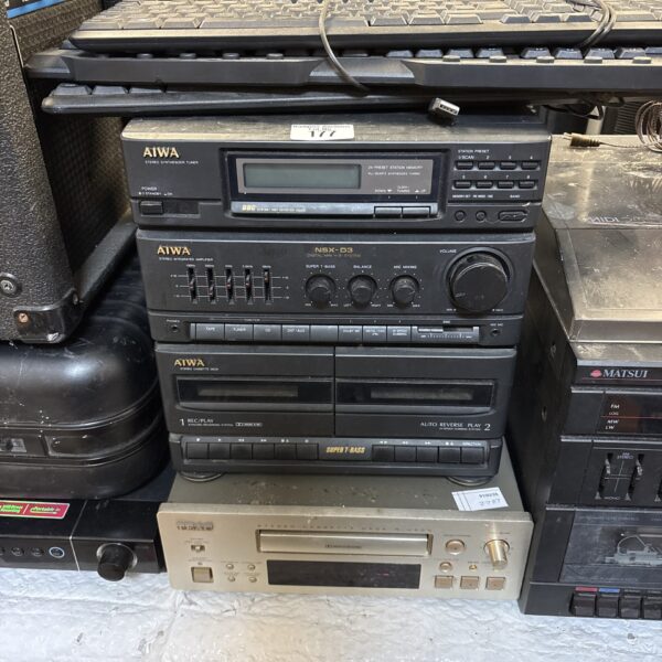 Vintage Awa R-H500 teak cassette deck, classic 1980s audio equipment.