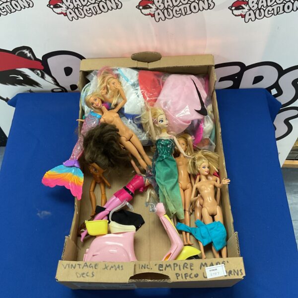 Vintage Barbie dolls and clothes lot for collectors.