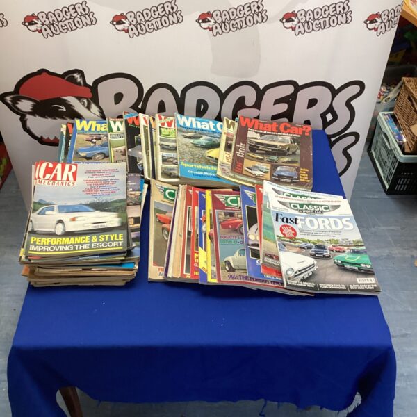 Bundle of vintage car magazines for collectors and enthusiasts.