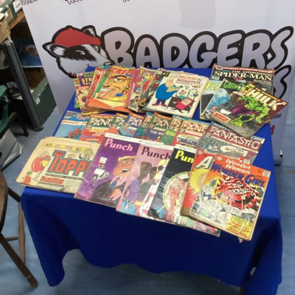 A colourful lot of vintage comic magazines, including Marvel titles.