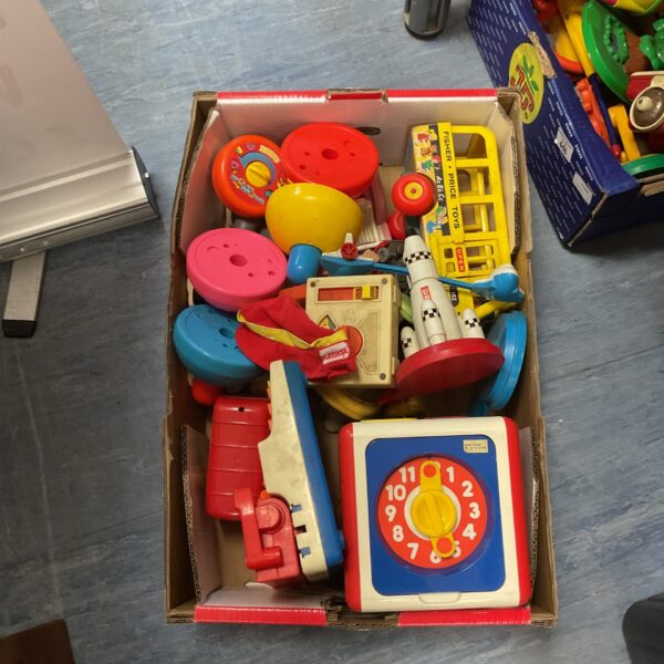 Vintage Fisher Price and Tomy toy lot, colourful retro toys.