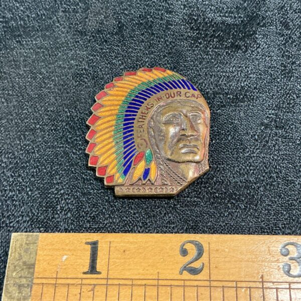 Vintage enamel badge featuring an Indian chief head.
