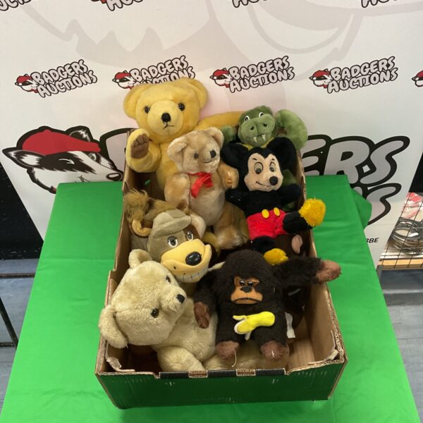 Vintage stuffed toy lot with teddy bears and Mickey Mouse.