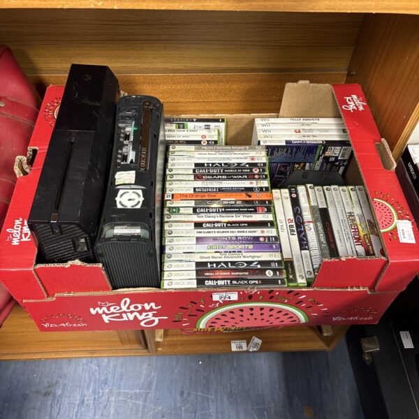 Xbox 360 and Xbox One console lot with games for retro gaming.