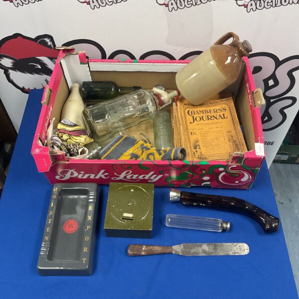 Antique glass bottles, magazines and flagons in a mixed lot.