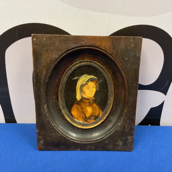 Antique miniature oil portrait painting of a young maiden.