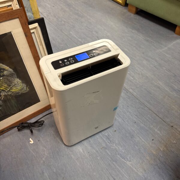 White Blyss portable dehumidifier with digital display panel.