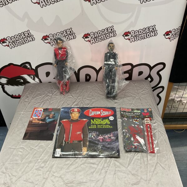 Captain Scarlet memorabilia lot including figures and study kit.