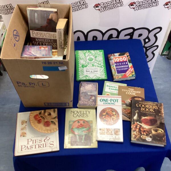 Mixed lot of vintage cookbooks and romance novels for sale.