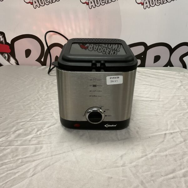 White Delta deep fryer, vintage kitchen appliance for frying food.
