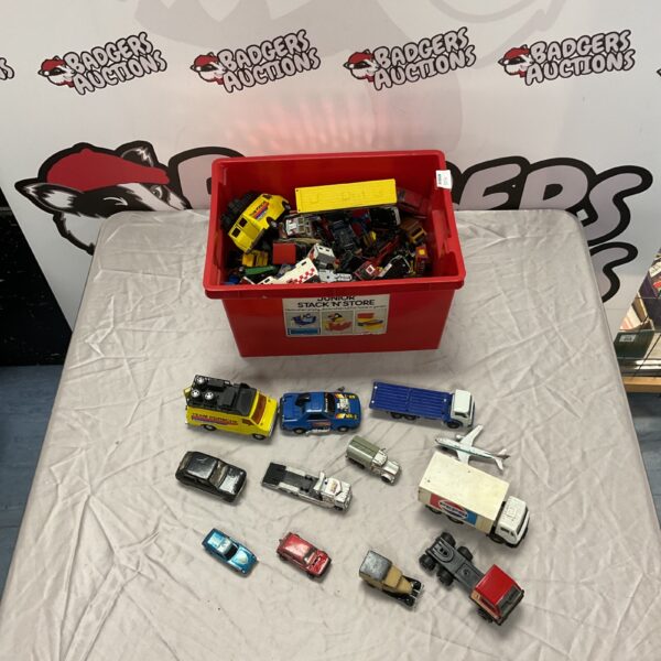 A colourful lot of vintage diecast model cars and trucks.