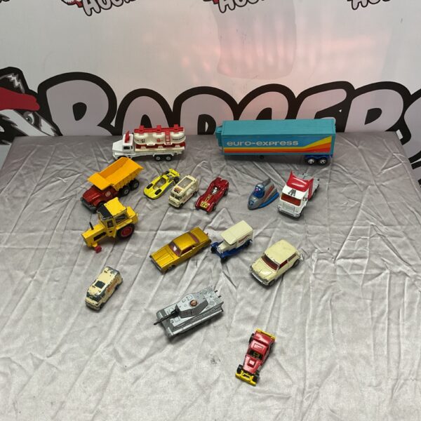 Vintage diecast model cars lot, including Matchbox and Corgi vehicles.