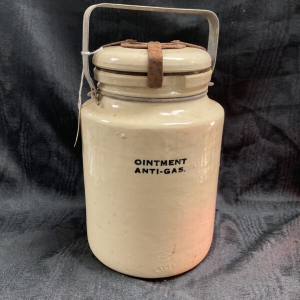 Antique Doulton ointment flask marked 6/56, a collectible ceramic item.