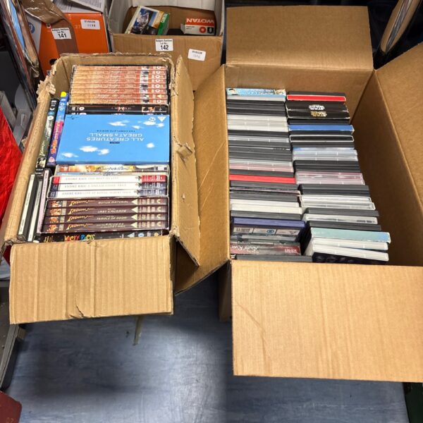 Mixed lot of DVD box sets and films for home entertainment.