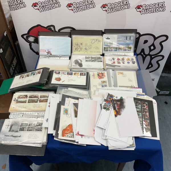 Large collection of first day stamp covers including Harry Potter and Transformers themes.