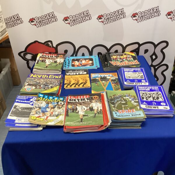 Vintage football programs collection including Watford and Man United.