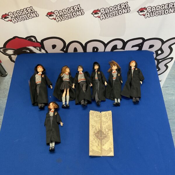 Harry Potter figures lot including Harry, Ron, Hermione, and Ginny.