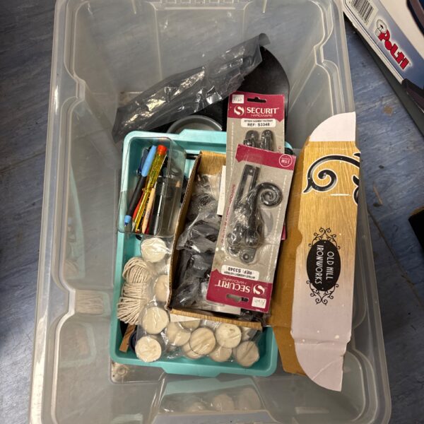 House clearance lot with mixed items and tealights.