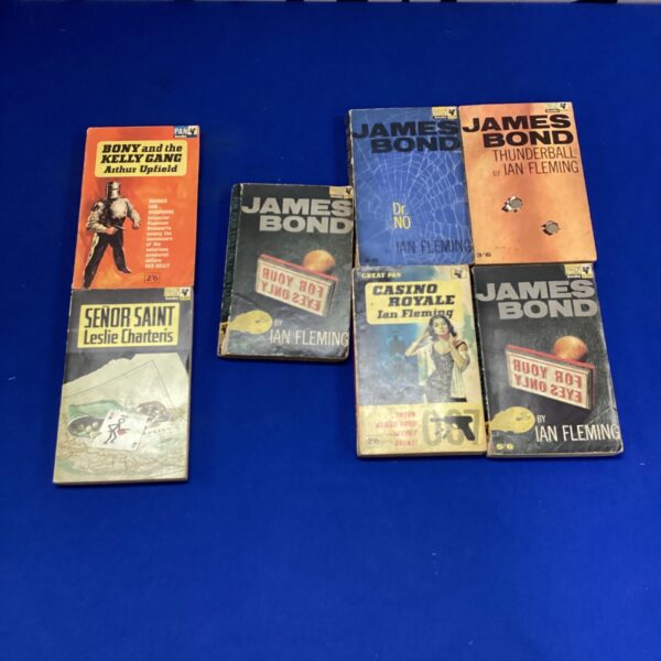 Vintage James Bond paperback books by Ian Fleming in a collection.