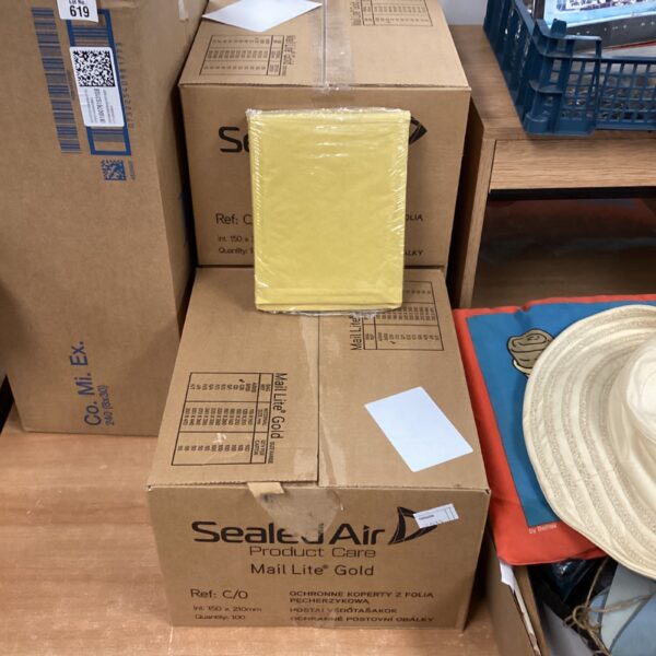 Three boxes of new jiffy bags for secure mailing.