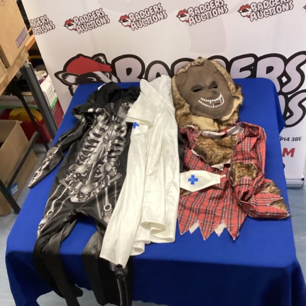 Kids fancy dress bundle including nurse, wolfman and Batman costumes.