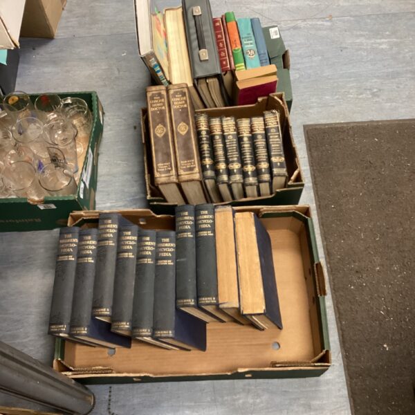 Mixed book lot featuring vintage children’s encyclopedia and home doctor books.