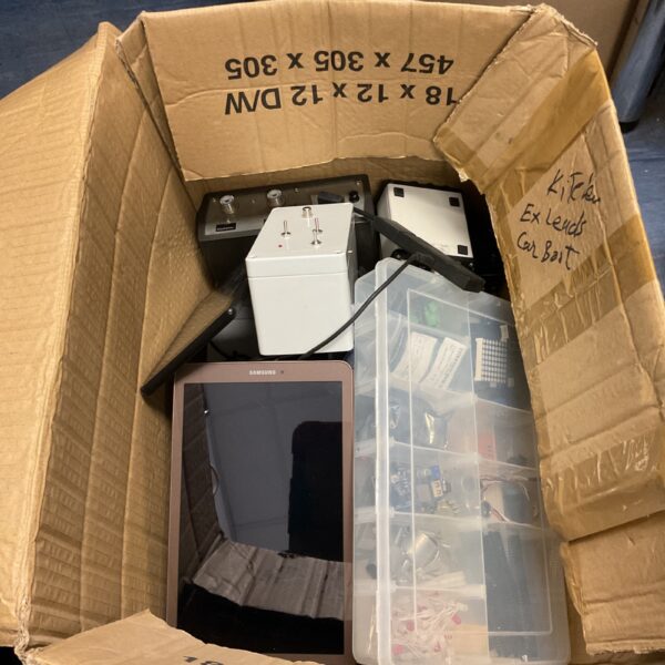 Mixed electronics lot with tablets and components.