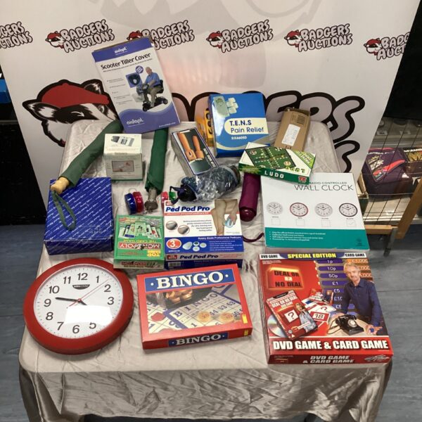 Mixed lot of board games and umbrellas for collectors.