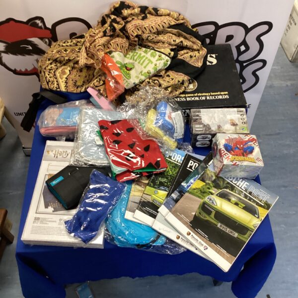 Mixed house clearance lot with books and a puzzle.