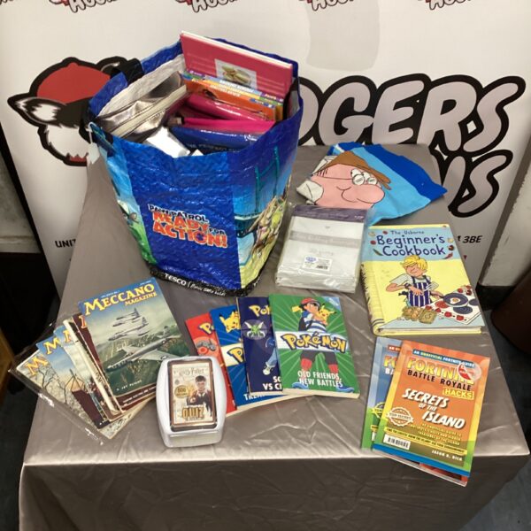 Mixed lot of Pokémon and Fortnite books and magazines.