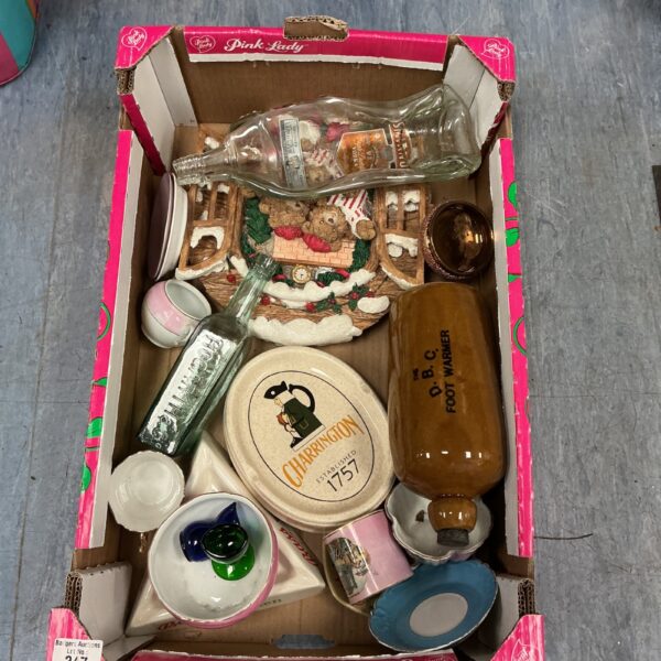 Vintage mixed lot of bottles and pub ashtrays for collectors.