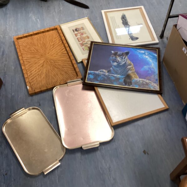 Mixed lot of vintage serving trays and framed pictures for home decor.