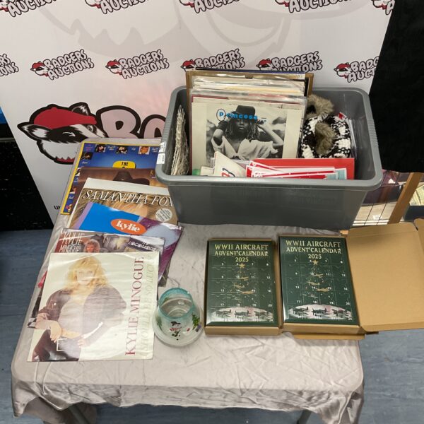 Mixed lot of vinyl records, WW2 calendar, and Christmas items.