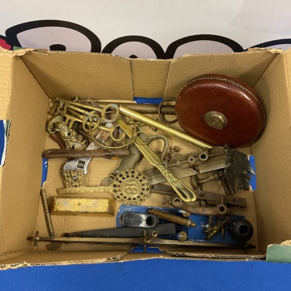 Mixed metalware lot featuring vintage scales, keys, and a letter opener.