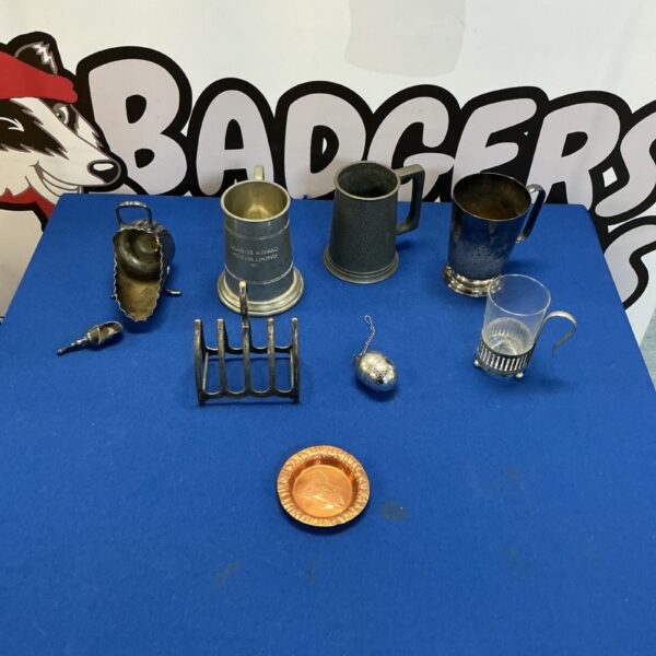 Mixed metalware lot featuring antique tankards and other metal items.
