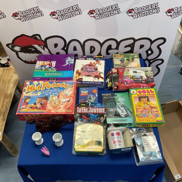 Mixed toy and game lot including Hot Potato, Disney games, and Lego.